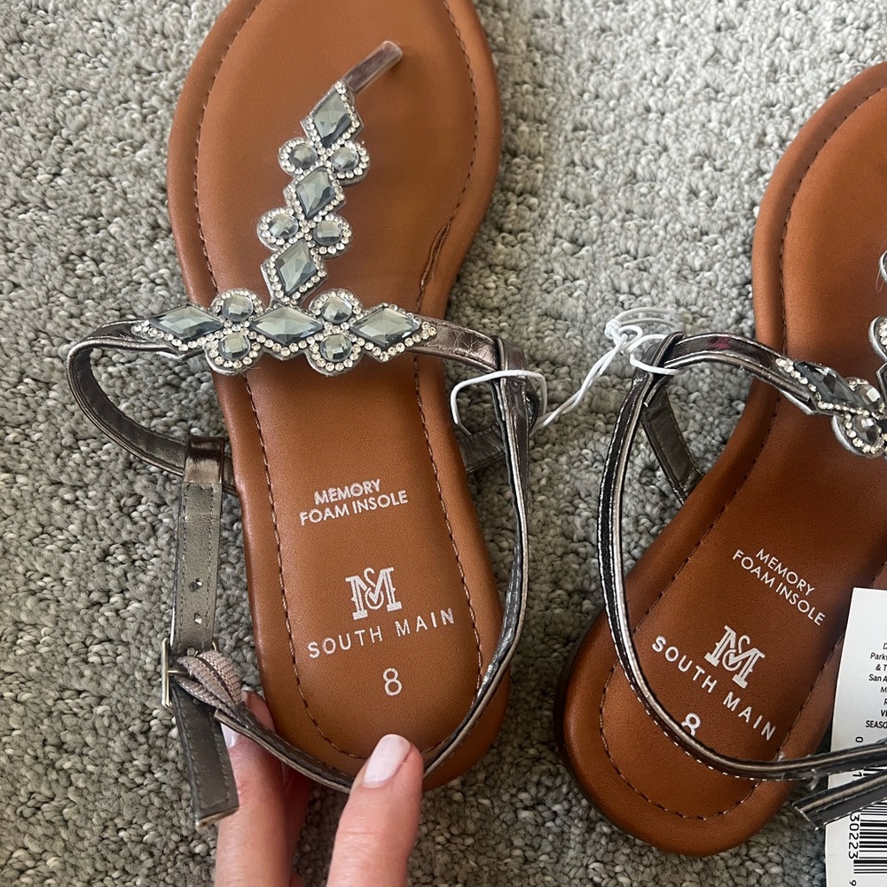 Silver Rhinestone sandals and memory foam soles.